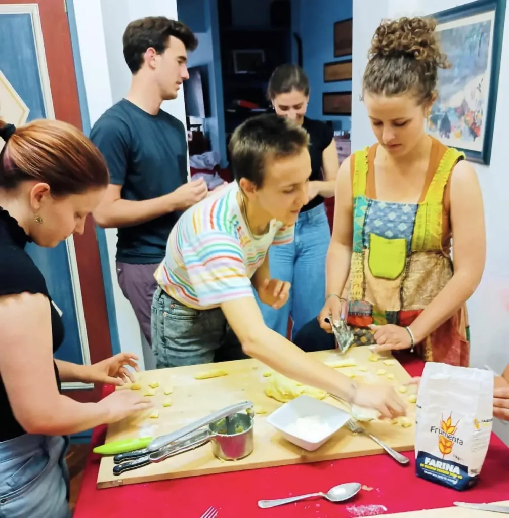 Students cooking while learning Italian in Rome